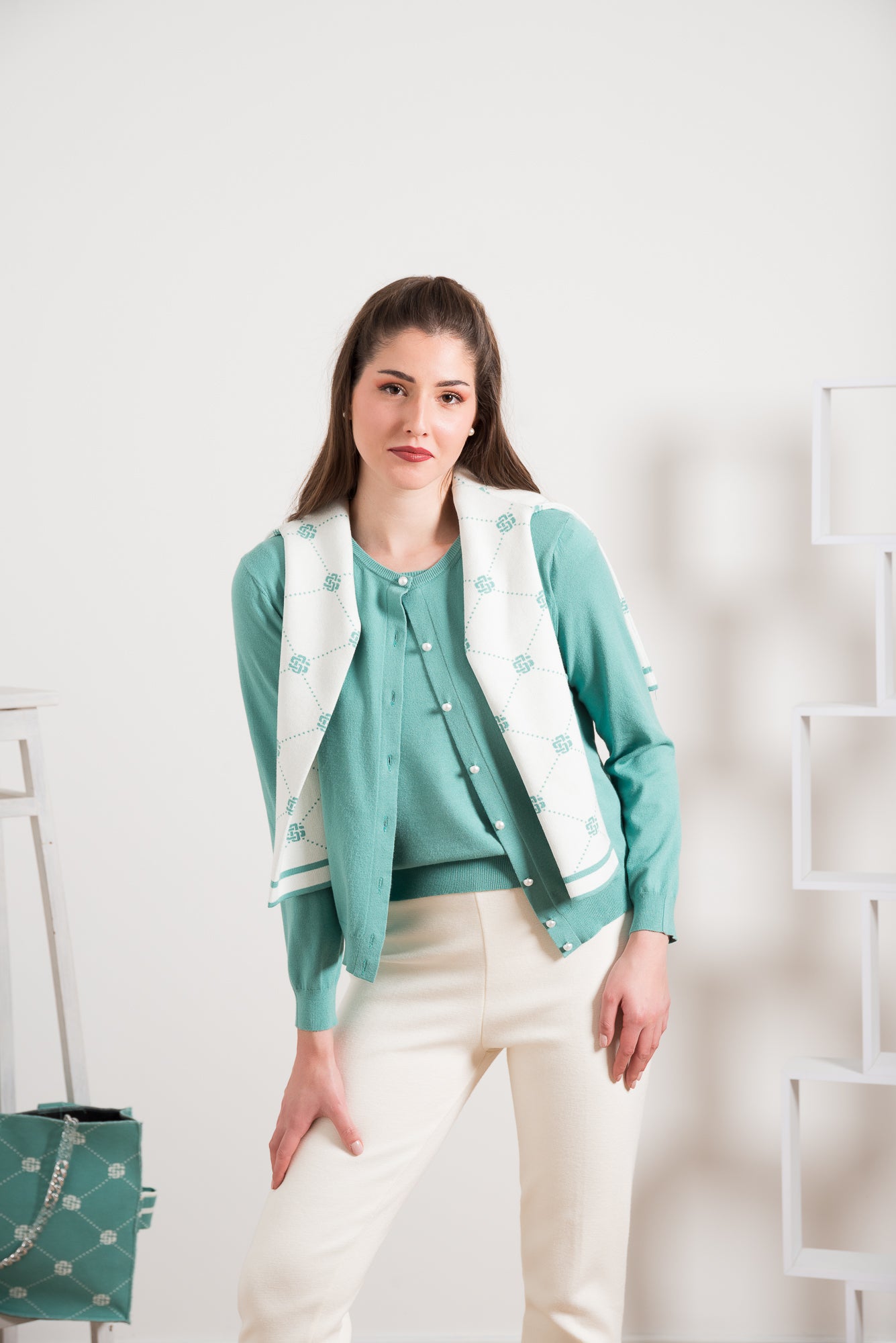 Golfino con bottoncini perlati